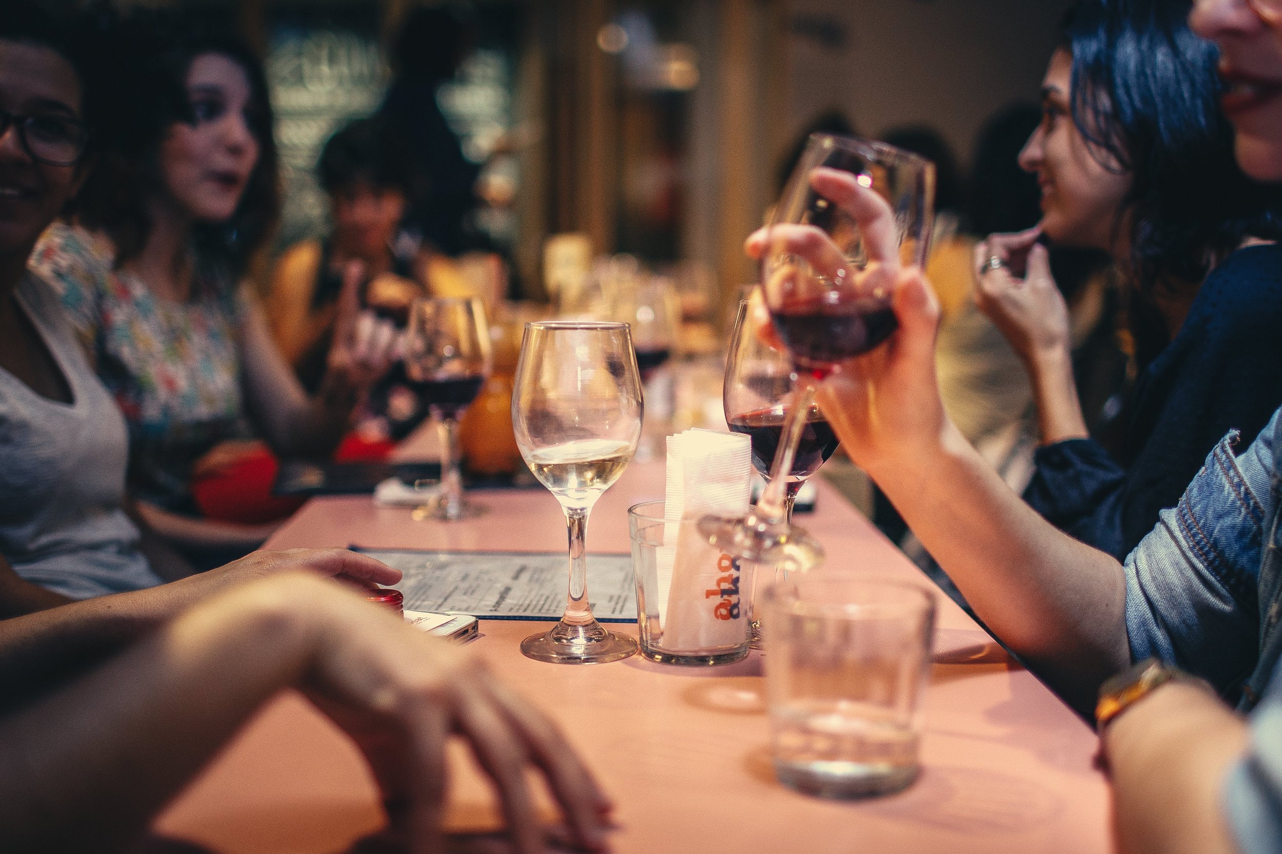 People dining and enjoying drinks